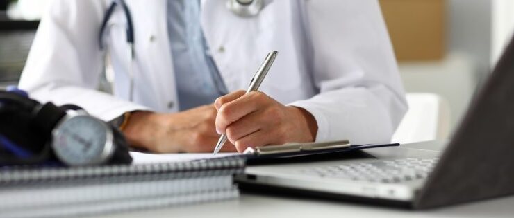 physician taking notes