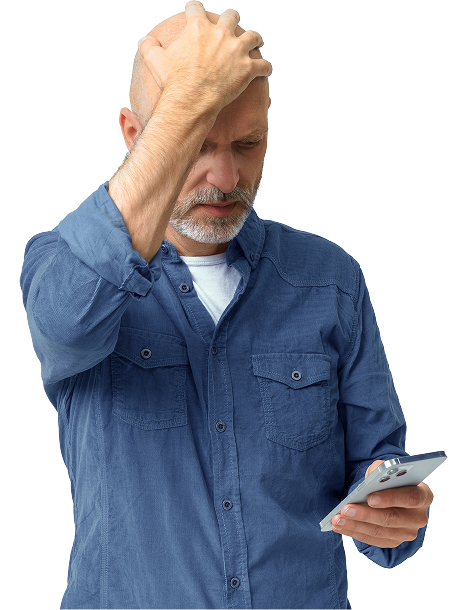 Man rubs his forehead while scrolling on his phone